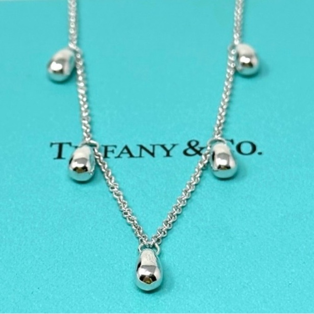 Authentic Tiffany & Co. Peretti 5 Teardrop Charm Necklace.